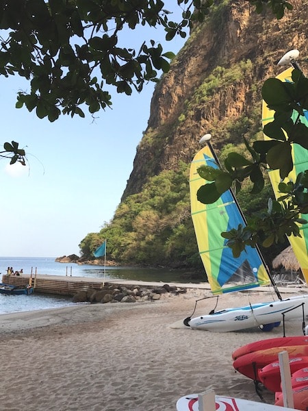 sugar beach saint lucia with wind surf boards showing some of the fun things to do in St. Lucia