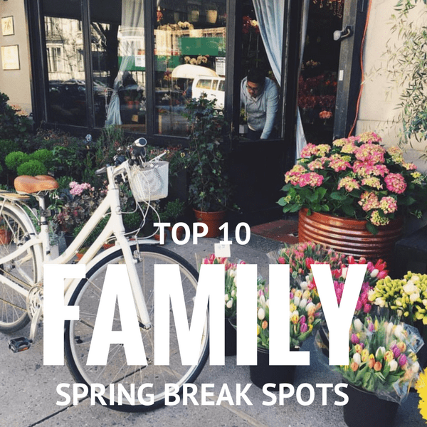 Frontal view of a flower shop and white bike reading, "Top 10 Family Spring break spots."