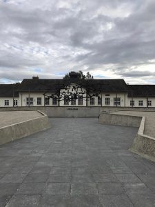 sculpture at dachau illustrating a visit