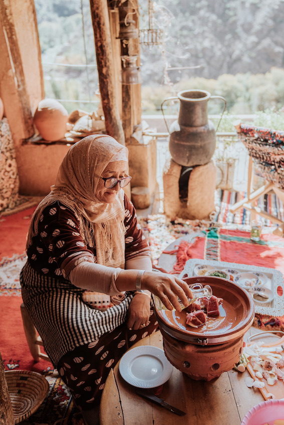 local moroccan women cooking in a tangine