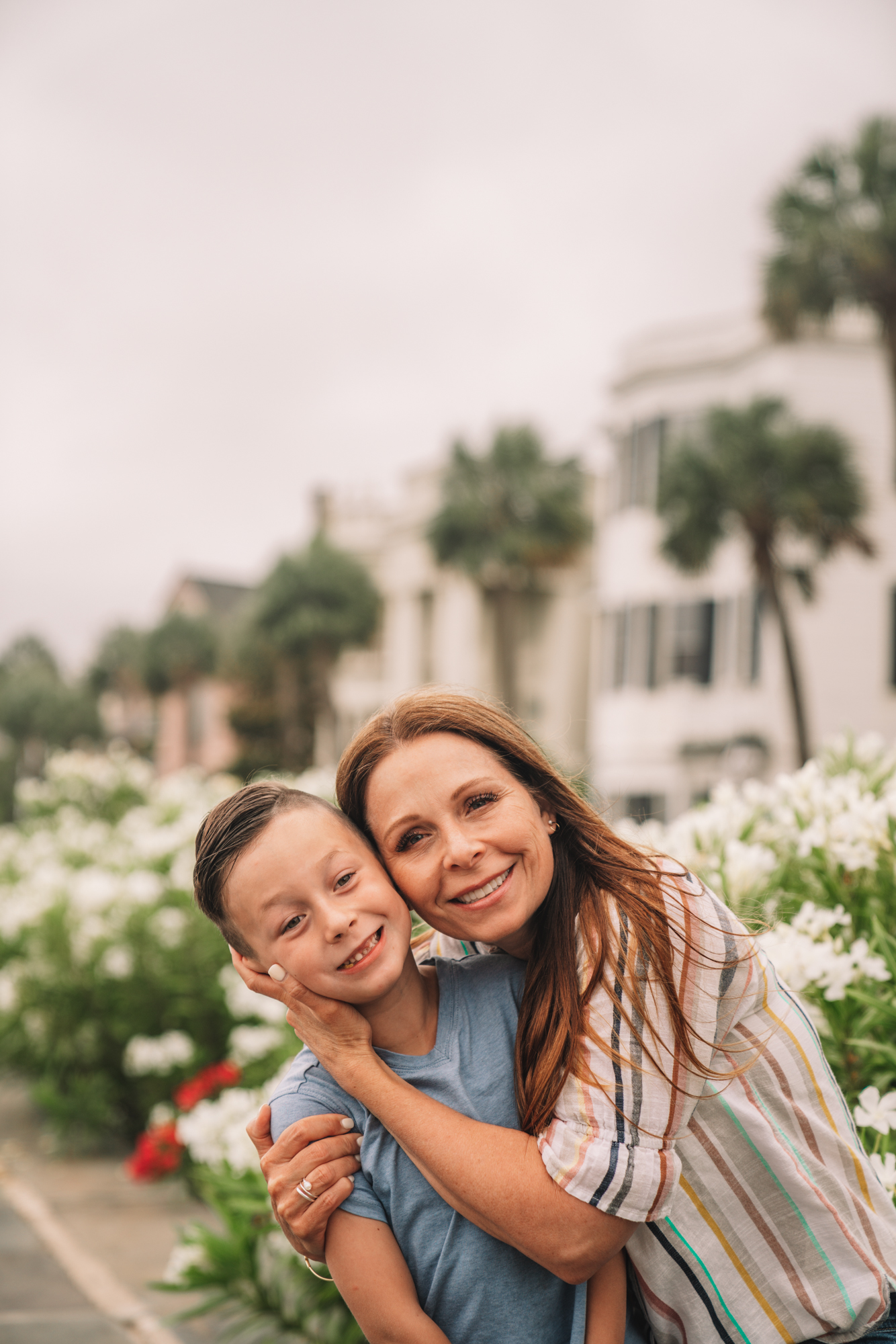 Things to do in Charleston sc with kids - a little boy and his grandma smile on the battery in Charleston.