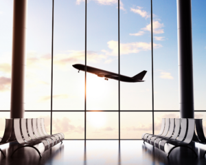 airport waiting room with plane departure