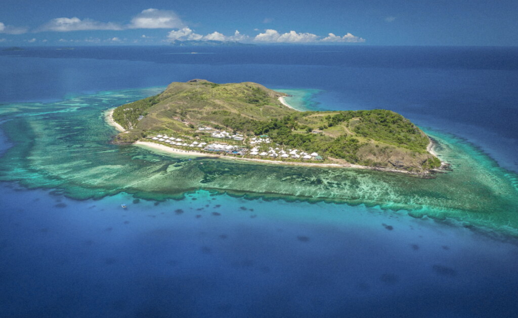 Sheraton Resort & Spa Tokoriki Island Fiji aerial view showing private island surrounded by coral reefs and turquoise lagoon